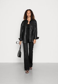 Guess SEXY BOOT - Calças de ganga bootcut - planet luxe