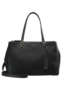 Svart läderhandväska med en strukturerad yta, dubbla topphandtag och en avtagbar rem. Har en loggoge ntagg och detaljer i guld.