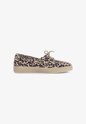 Beige sole boat shoe with leopard print upper and tied front laces on white background, side view.