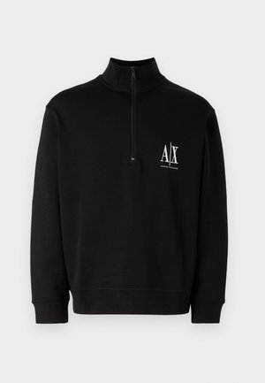 Črna zip-up dukserica iz bombažne mešanice. Ima visok ovratnik, rebraste manšete in majhen bel logo na levem prsnem delu.