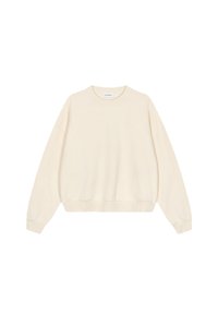 Sweat-shirt de couleur crème avec col rond, épaules tombantes, poignets et ourlet côtelés. Confectionné dans un tissu doux, avec une étiquette de marque discrète.