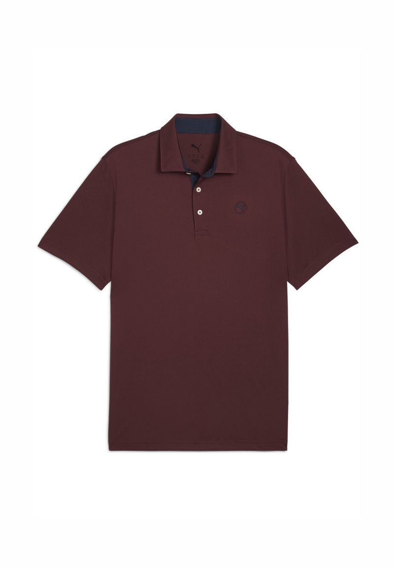 Burgundy polo skjorte med krave og tre knapper, prydet med et lille logo på venstre bryst. Simpelt design, sat mod en hvid baggrund.