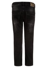 Černé džíny se střihy rovného nohavic, vybavené dvěma zadními kapsami a koženou etiketu na pasu. Hladký povrch, minimální vyblednutí.