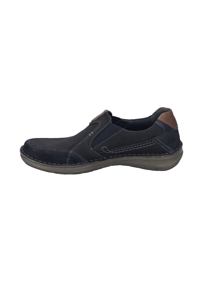 Leather slip-on shoe in navy with brown accents, featuring stitching details and elastic side panels for flexibility. Rounded toe and rubber sole.