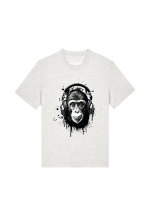 T-shirt gris clair avec un visage de gorille noir et blanc détaillé portant de grands écouteurs, orné d'un motif de projections de peinture noire.