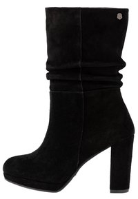 Black suede ankle boots with a stacked heel, gathered detailing around the shaft, and a logo accent on the side. Smooth texture.