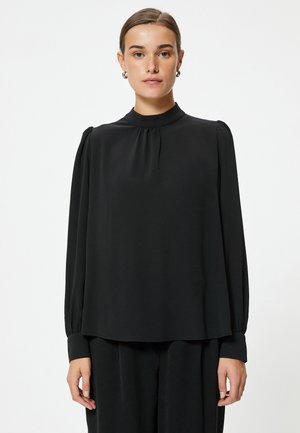 Pusero - black