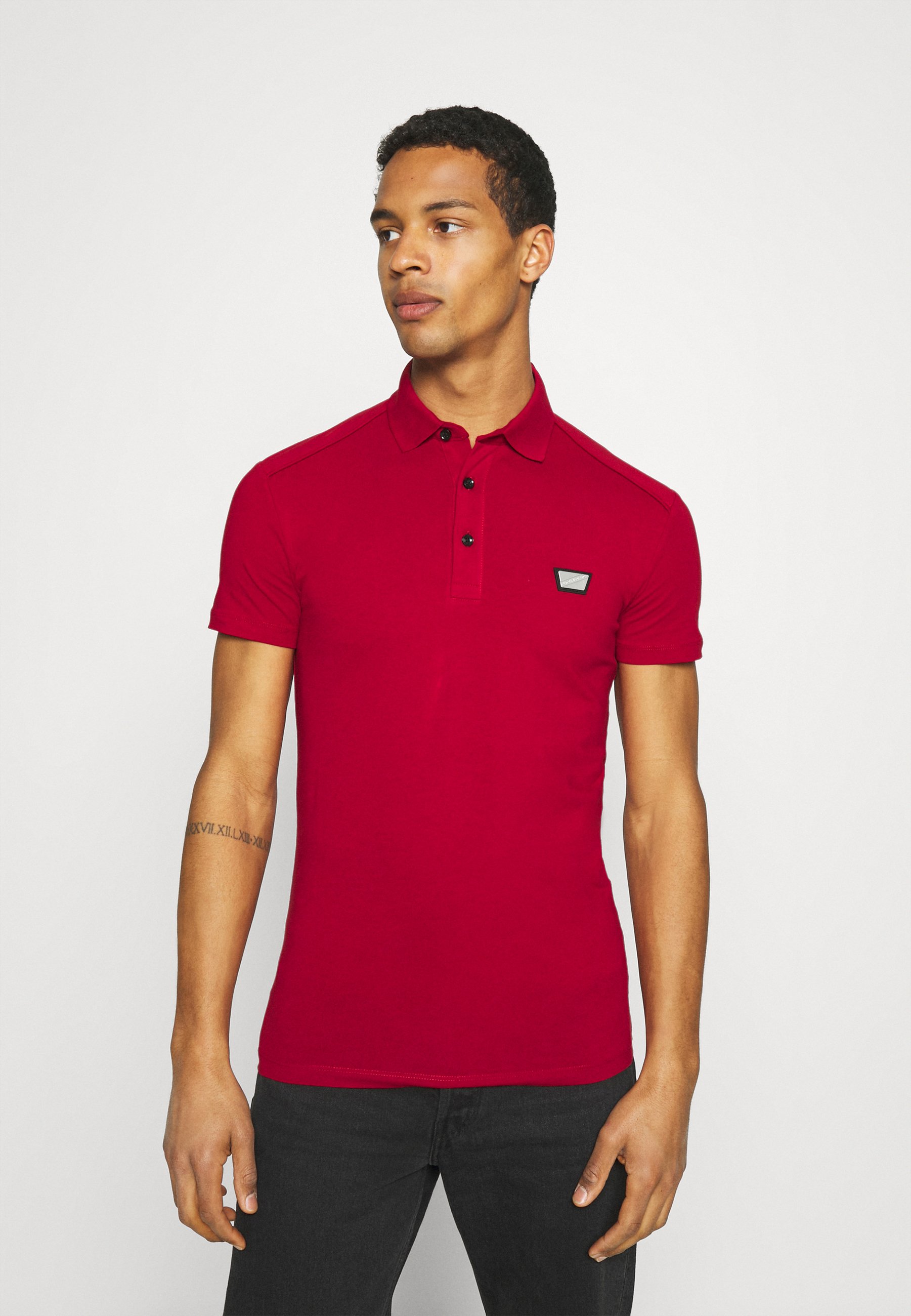 FRONT - Polo shirt - rosso 