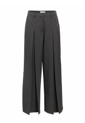 Tumedate hõlmas tumedast hallist kangast, millel on ees olevad voldid, kõrge vöökoht ja vöökohad. Sile tekstuur ja täpselt õmmeldud viimistlus.