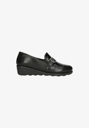 Scarpe slip-on in pelle nera con punta arrotondata, una fibbia decorativa e suola a zeppa bassa. Texture liscia con finitura lucida.