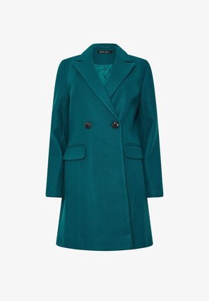 Teal kaksirivinen takki suurilla mustilla nippeleillä, viistopeltoisilla lapelsillä ja kahdella etutaskulla, joissa on sileä kangas ja räätälöity istuvuus.