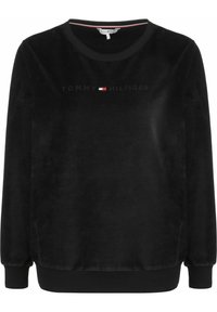 Sudadera de terciopelo negro con mangas largas, cuello y puños acanalados. Presenta el logotipo en relieve "TOMMY HILFIGER" en el pecho.