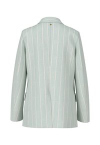 Helles blaues Blazer mit vertikalen weißen Streifen, mit einem Schlitz hinten, mit Reverskragen und zwei seitlichen Taschen. Glattes, strukturiertes Material.