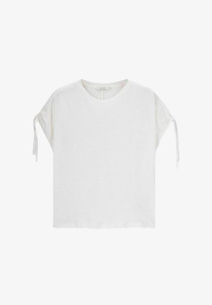 Witte katoenen T-shirt met korte mouwen en koordaccenten. Ronde halslijn en losse pasvorm. Zachte textuur, minimalistisch ontwerp.