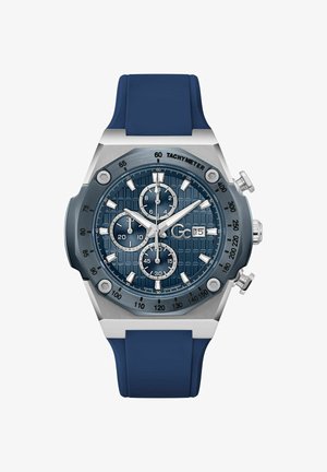 Chronografur med en blå struktureret urskive, kasse i rustfrit stål, sølvfarvede accenter og en blå gummirem. Har en tachymeterskala.
