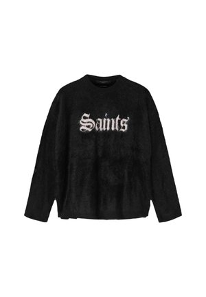 Czarny sweter z miękkiego materiału z długimi rękawami, z napisem "Saints'" w białej gotyckiej czcionce na przodzie. Okrągły dekolt, luźny krój.