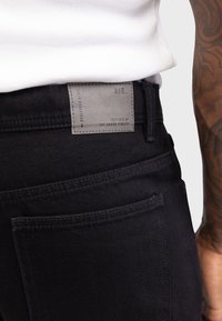 Redefined Rebel COMO LOOSE FIT - Wijde jeans - black