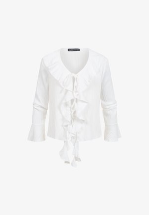 Hvid bluse med lange ærmer og flæset V-udskæring, lommeknappet lukkning foran og vidt udstående manchetter, lavet af tekstureret stof.