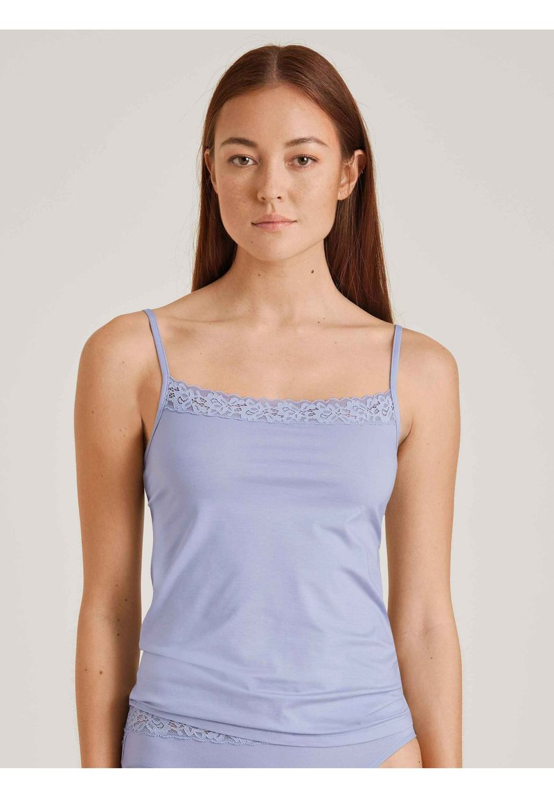 Light purple camisole with adjustable spaghetti straps and a lace trim along the neckline. Smooth fabric with a fitted design.