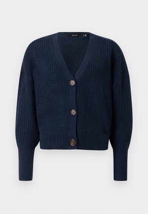 Námořnická modrá hrubě pletená kardigan s véčkovým výstřihem, třemi velkými knoflíky, dlouhými rukávy a žebrovanými manžetami a lemem.