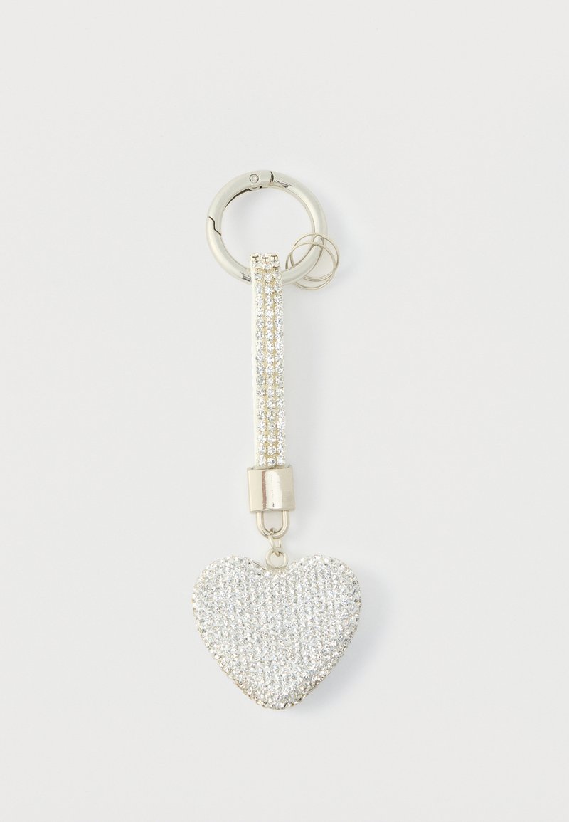Silver keychain with a heart-shaped pendant, covered in clear rhinestones, attached to a shiny silver ring and a textured strap.