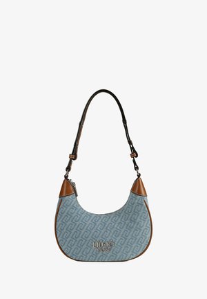 Lichtblauwe handtas met bruine leren accenten, met een getextureerd patroon, een gebogen vorm en een afneembare schouderriem. Logo duidelijk zichtbaar.