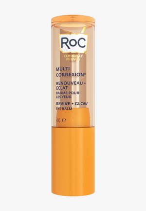 Balsamo per gli occhi Roc Multi Correxion in un tubo trasparente con un cappuccio arancione. Contiene 4g, con testo blu scuro sull'etichetta. Finitura liscia.
