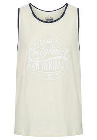 Lys beige tank top med rund halsudskæring, marineblå detaljer ved kraven og ærmelinjerne, med et stort hvidt grafisk print.