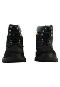 Black work boots with a sturdy design, featuring gray accents, metal eyelets, and a textured sole for traction. Laces are black with reflective details.