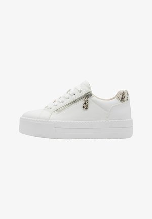 White platform sneaker with lace-up front, side zipper with textured pull, and snake-patterned heel accent.