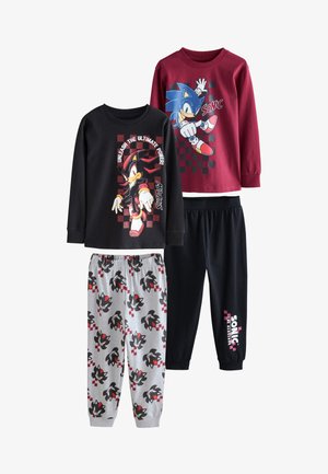 Dos conjuntos de camisetas de manga larga y pantalones a juego con temática de Sonic the Hedgehog, con los personajes Sonic y Shadow y patrones a cuadros.