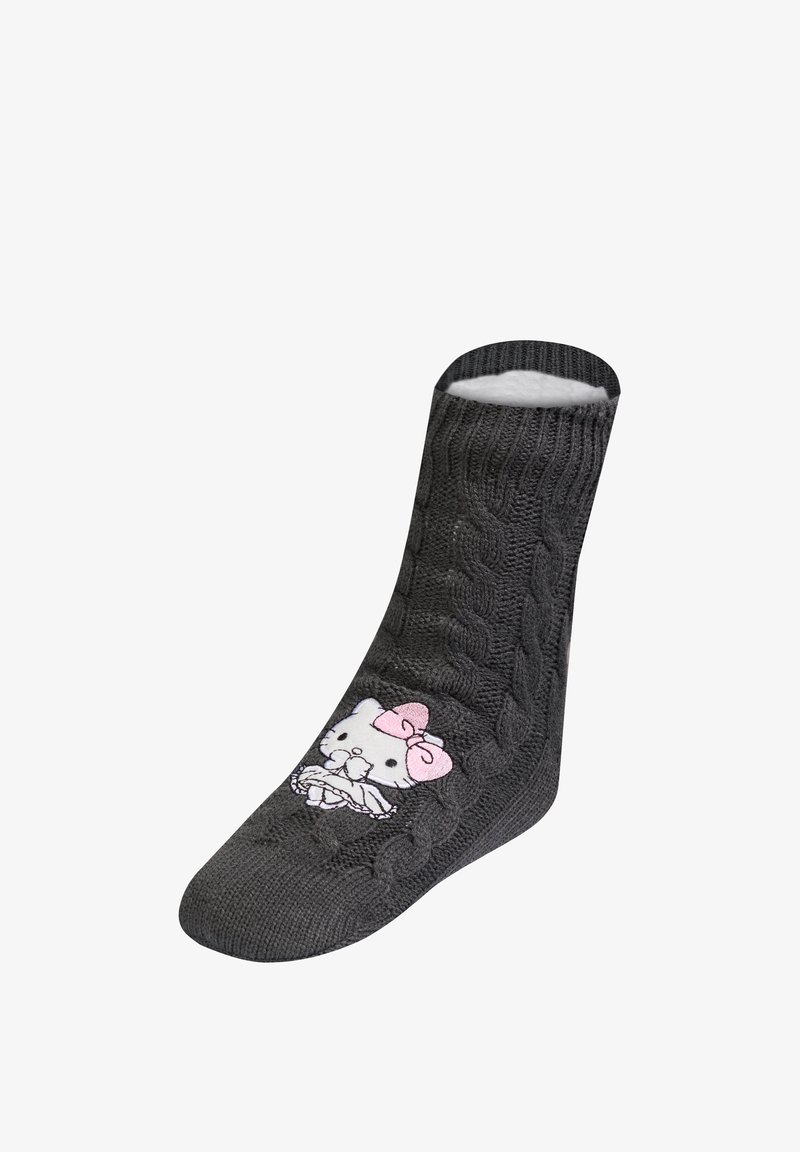 Skarpetka w kolorze szarym, pleciona w warkocze, z miękkim wnętrzem. Po boku znajduje się wzór Hello Kitty w kolorze białym i różowym. Gładka faktura dzianiny.