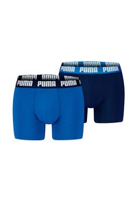 Zwei Paar Boxershorts in Blau und Marineblau. Weicher Stoff, mittellanges Design, elastischer Bund mit weißem Puma-Logo.