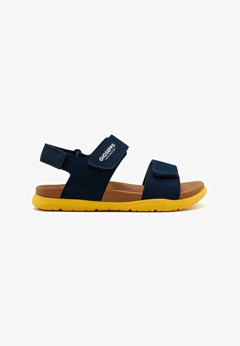 Sandalias de tela azul marino con suelas de goma amarilla; correas ajustables de Velcro; diseño ligero; estilo semiabierto en la punta; calzado casual.