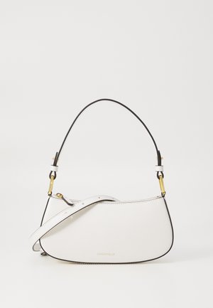 Valge nahast kott erineva kujuga, musta ääristusega, reguleeritava rihmaga ja kuldsete detailidega. Omab lukuga sulgemist ja logo kaunistust.