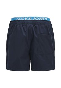 Marine zwemshorts met elastische tailleband, voorzien van lichtblauwe "JACK & JONES" branding, zijzak en glad, lichtgewicht stof.