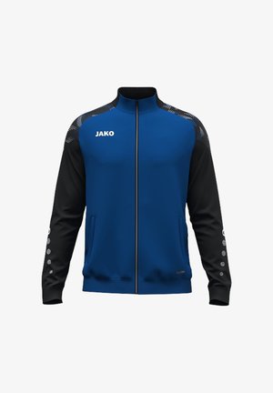 Blue and black full-zip sports jacket with high collar, JAKO logo on chest, patterned shoulder strips, and dots on sleeves.