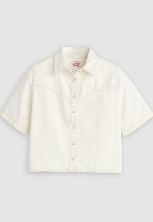 Short-sleeve, off-white cropped button-up shirt with pointed collar and visible seam details on chest and sleeves.
