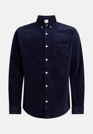 Navy corduroy long-sleeve shirt with button-down collar, front pocket, and white buttons. Textured fabric with ribbed pattern.