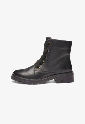 Black leather ankle boot with thick rubber sole, wide fabric laces through metal eyelets, and padded interior lining visible at the top.