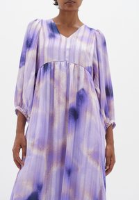 Purple floral-patterned dress with a V-neck, long puff sleeves, and gathered waist; made from lightweight, flowy fabric with vertical stripes.