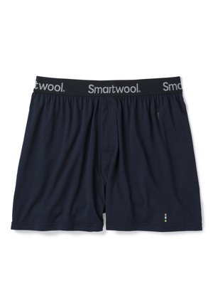 Tmavě námořnické bavlněné boxerky s elastickým pasem, na kterém je šedé logo "Smartwool". Obsahují malý vícebarevný akcent.