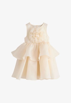Ärmelloses kleinkindliches Kleid in Cremefarbe mit geschichtetem Volantrock und großem Stoffblumendetail auf der Brust.