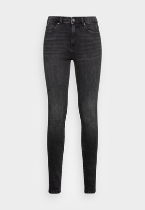 Jeans skinny noirs taille haute avec fermeture à boutons et zip à l'avant, poches avant et arrière, et un léger effet délavé sur les jambes.