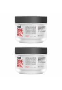 KMS Tame Frizz Glättungsreconstructor in einem klaren Behälter mit schwarzem Deckel. 200 mL Kapazität. Der Text auf dem Etikett beschreibt Anwendung und Vorteile.