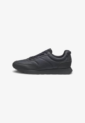 Black athletic sneakers made of textured leather with a smooth finish, featuring round laces, a solid rubber sole, and subtle branding patterns.