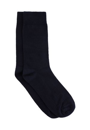 Dunkelblaue Crew-Socken aus glattem Stoff, mit subtiler Rippstruktur und horizontalen Streifen, verstärkter Zehen- und Fersenpartie.