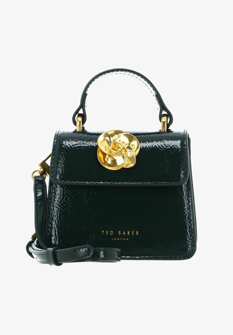 Sac à main en cuir verni vert avec un design structuré, accent de fleur en or, poignée supérieure et bandoulière amovible. Présente un logo en or.