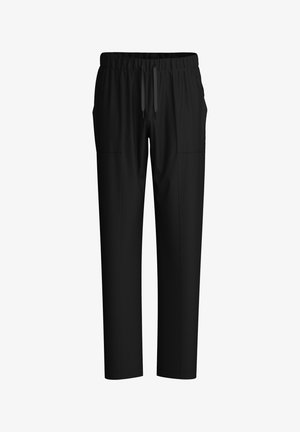 Zwarte joggingbroek van zacht materiaal, met een verstelbare tailleband, twee zijzakken en een taps toelopend model.