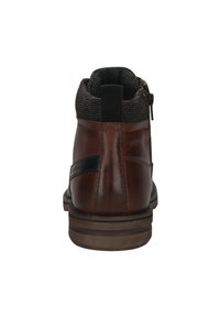 Brown leather ankle boot with a gray textured fabric collar, a side zipper, and a contrasting black accent on the heel.